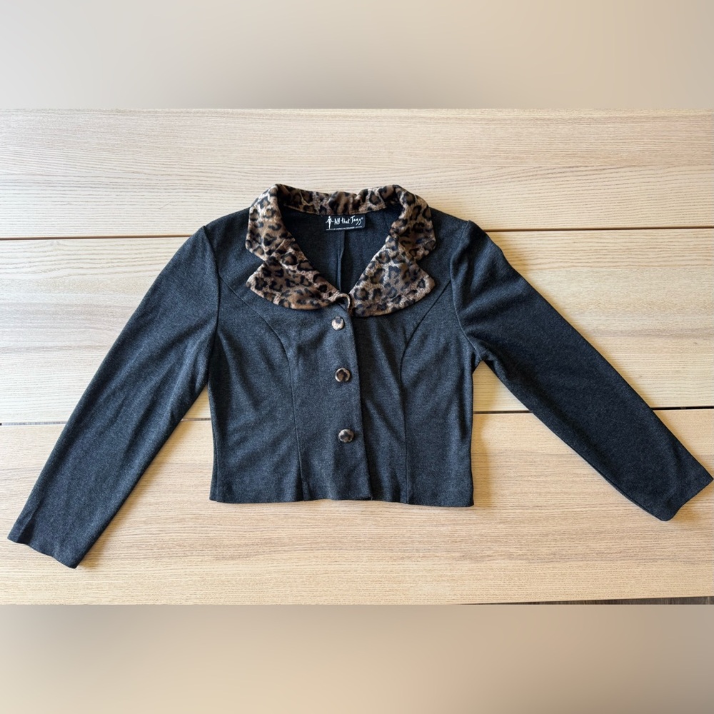 All That Jazz. Vintage black cropped jacket with leopard collar and buttons.